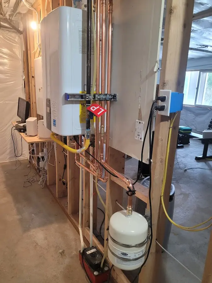 Licensed plumber repairing a kitchen sink in Fredericktown